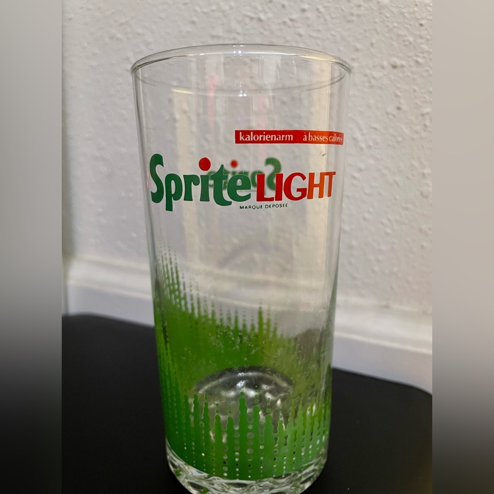Rare Sprite light Vintage collectable Swiss Drinking glass.